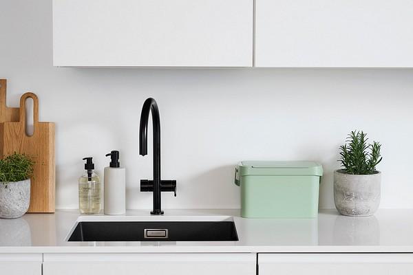 Compost bin placement near kitchen sink