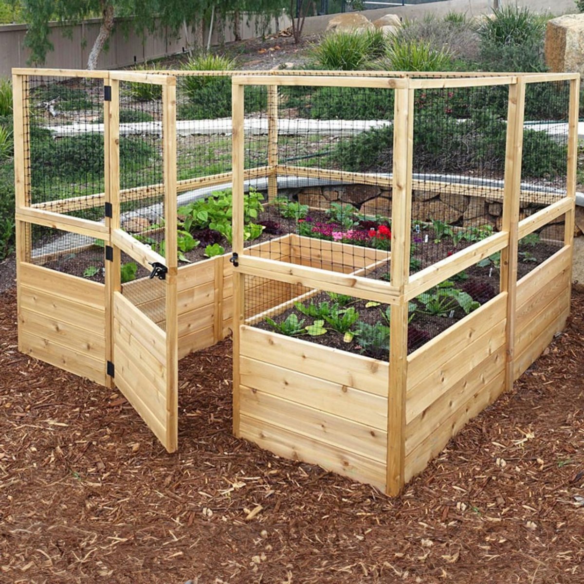 Secure fenced raised garden enclosure