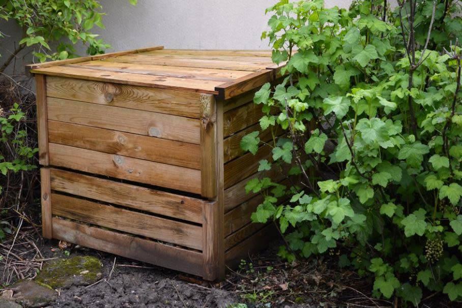 DIY wooden compost bin outdoors