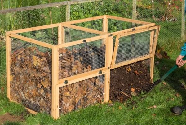 Wire mesh compost enclosure outdoors