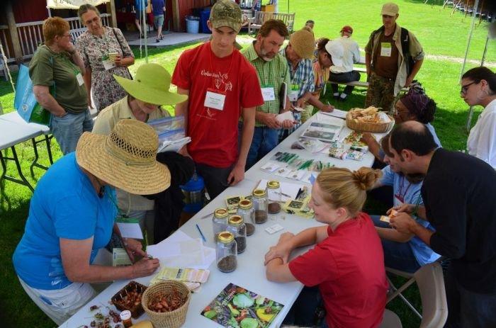 Gardeners sharing seeds together